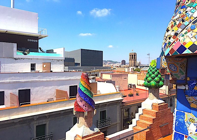 Atop the Palau Güell, chimneys with playful shapes designed by Gaudí